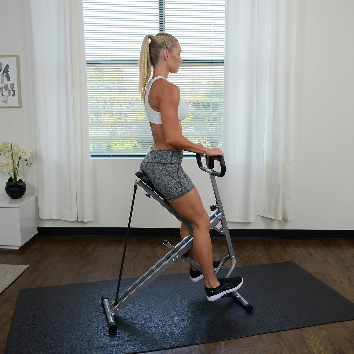 Transform Your Home Workouts with the Row-N-Ride Squat Assist Trainer - Adjustable Resistance & Foldable Design for Total Body Toning in Stylish Colors!